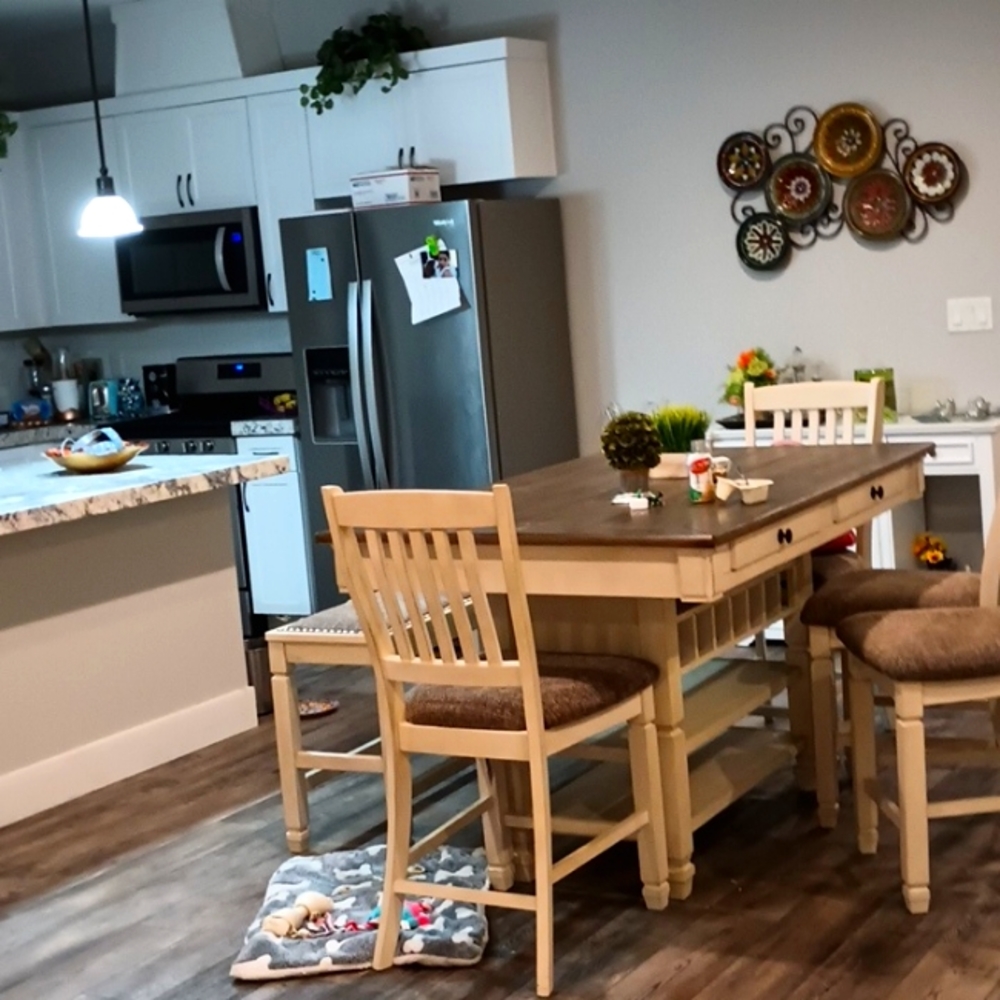 Townhouse or rent, four bedrooms, two and half bath. A bit over three years old,